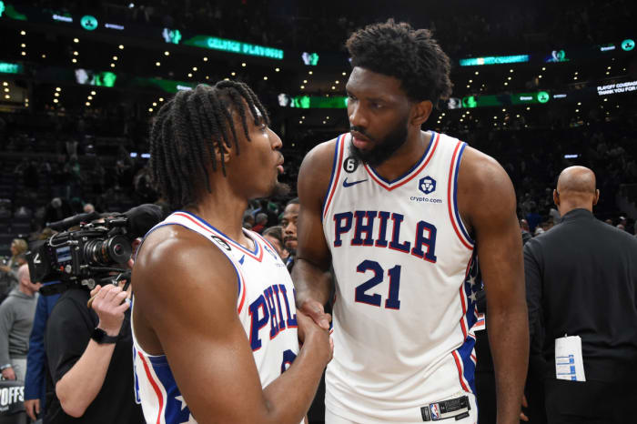Philadelphia 76ers guard Tyrese Maxey and center Joel Embiid shake hands